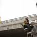 Equipment Operator Mike Reeve uses a crane to install a light post near the East Stadium bridge Nov. 13, 2012. Daniel Brenner I AnnArbor.com